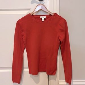 Ann Taylor Loft size XS sweater with button detail. Orange. Good condition.